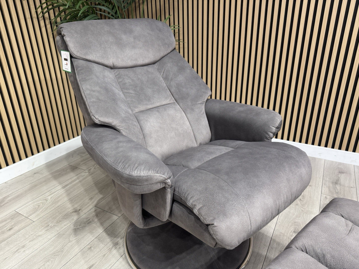 Relaxed Swivel Recliner Chair + Footstool RRP £899