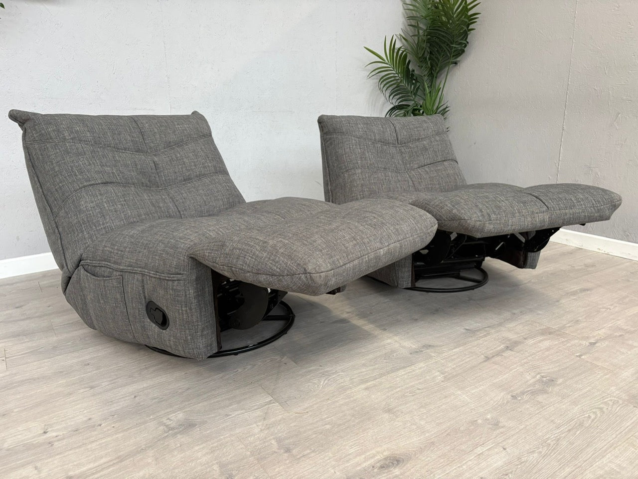 DFS Clarke Pair Of Swivel Rocker Manual Recliner Chairs - RRP £1058