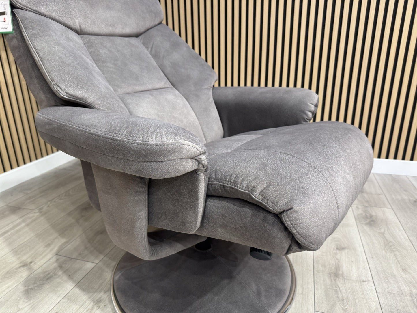 Relaxed Swivel Recliner Chair + Footstool RRP £899