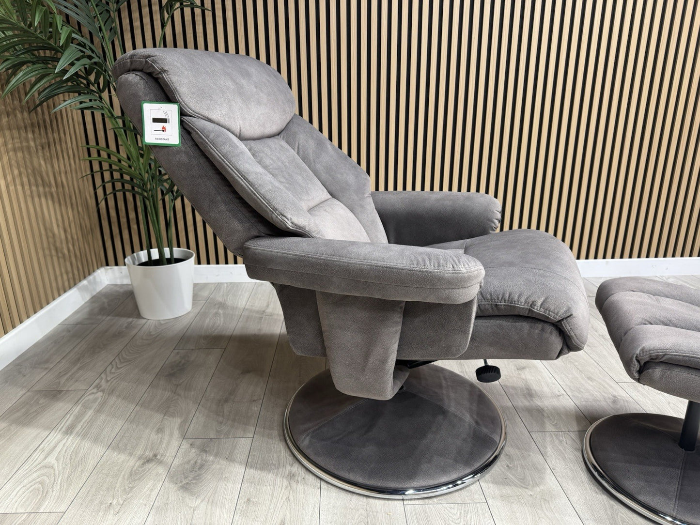 Relaxed Swivel Recliner Chair + Footstool RRP £899