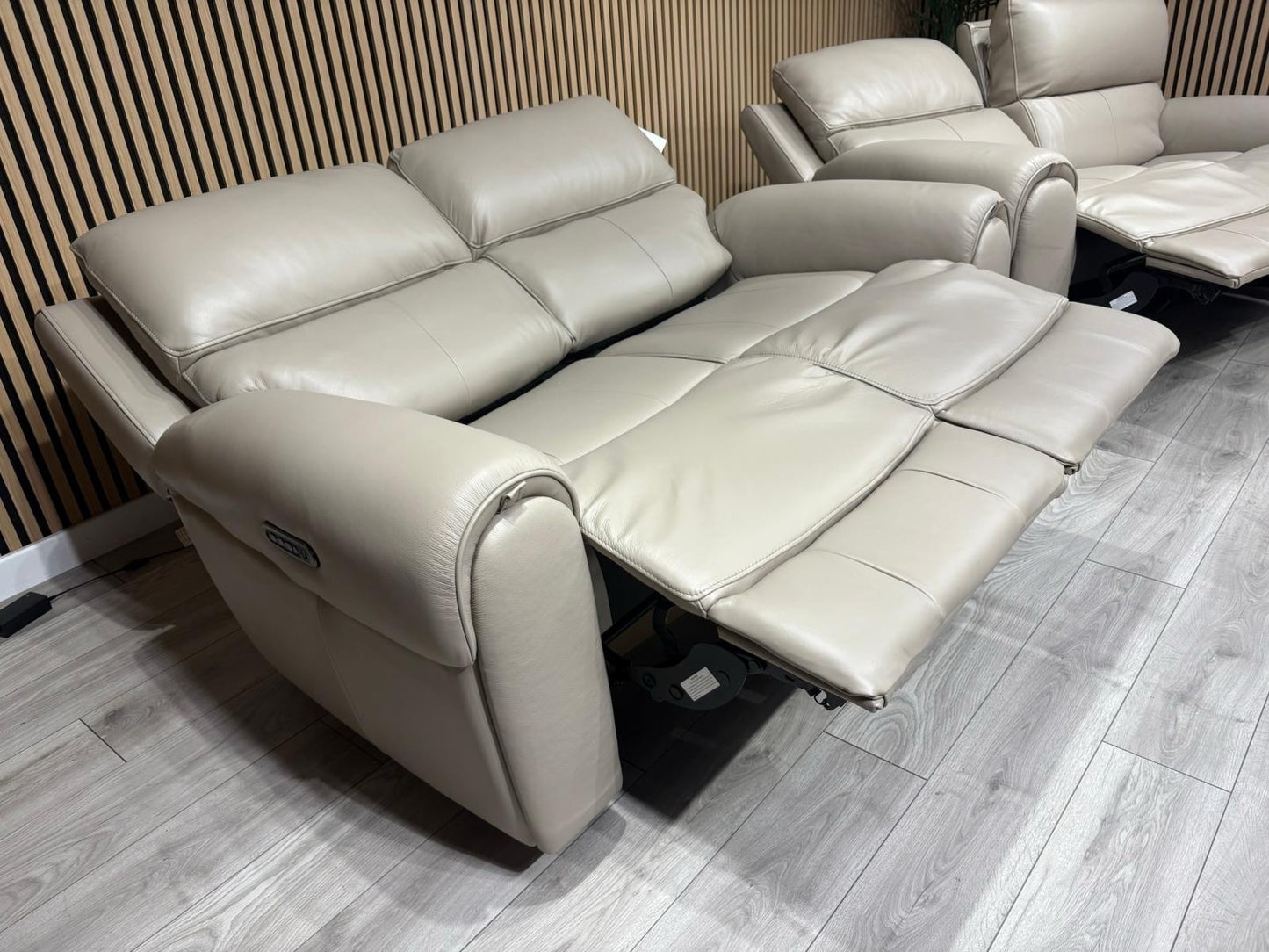 Oak FurnitureLand - EZRA Leather 2 x 2 Seater Power Recliner Sofa Set. RRP £5000