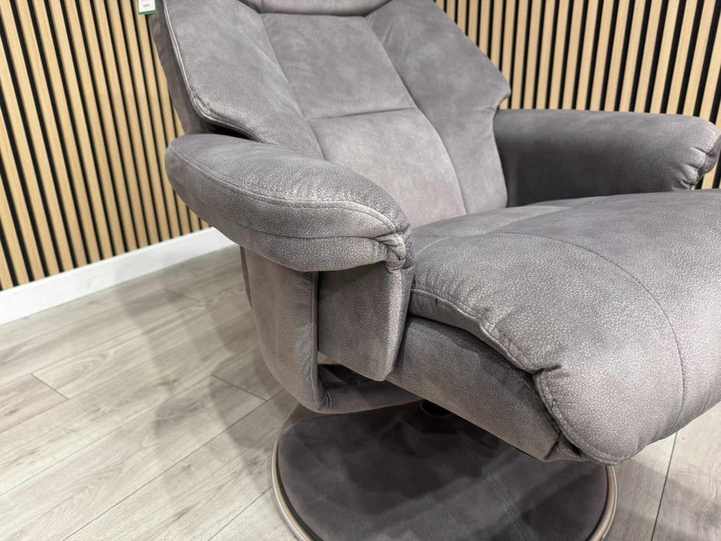 Relaxed Swivel Recliner Chair + Footstool RRP £899