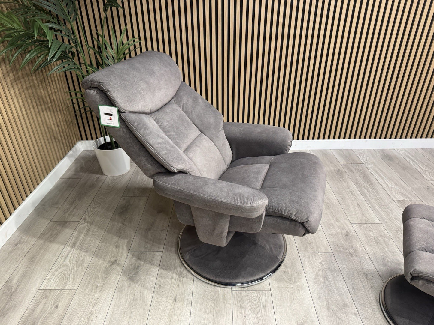 Relaxed Swivel Recliner Chair + Footstool RRP £899