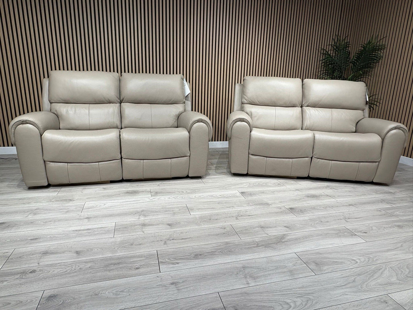 Oak FurnitureLand - EZRA Leather 2 x 2 Seater Power Recliner Sofa Set. RRP £5000