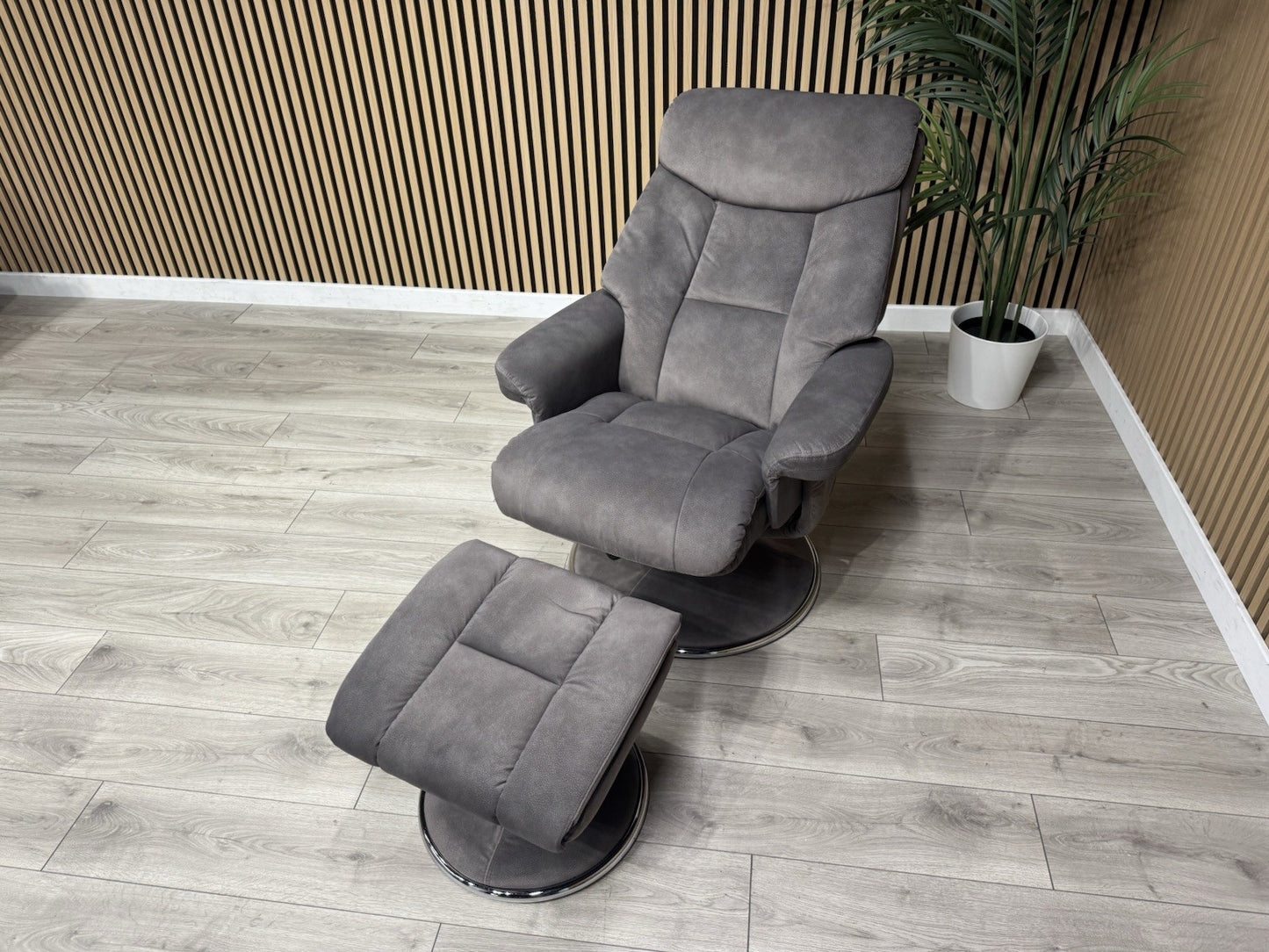 Relaxed Swivel Recliner Chair + Footstool RRP £899