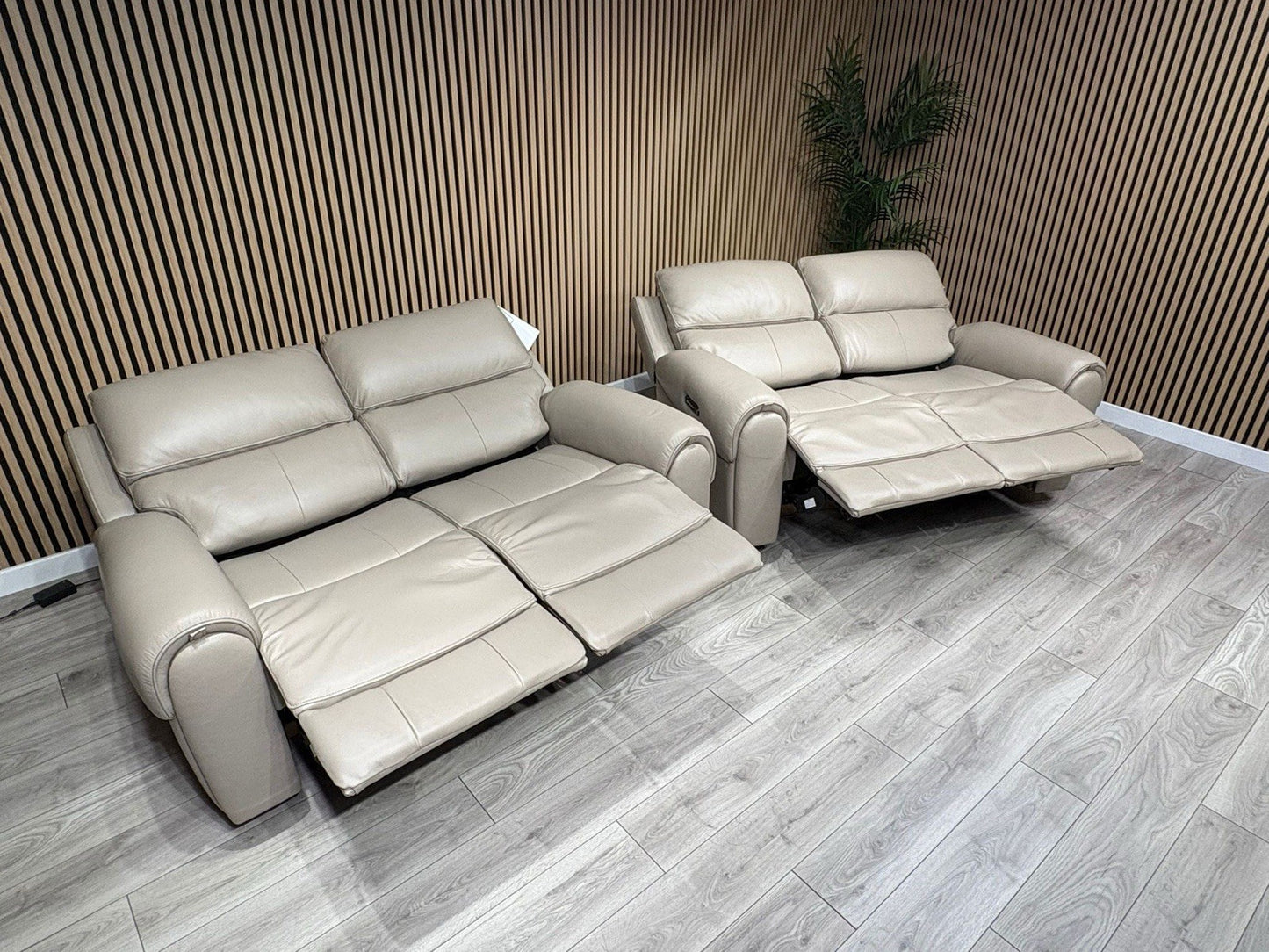 Oak FurnitureLand - EZRA Leather 2 x 2 Seater Power Recliner Sofa Set. RRP £5000