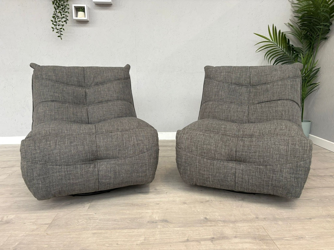 DFS Clarke Pair Of Swivel Rocker Manual Recliner Chairs - RRP £1058