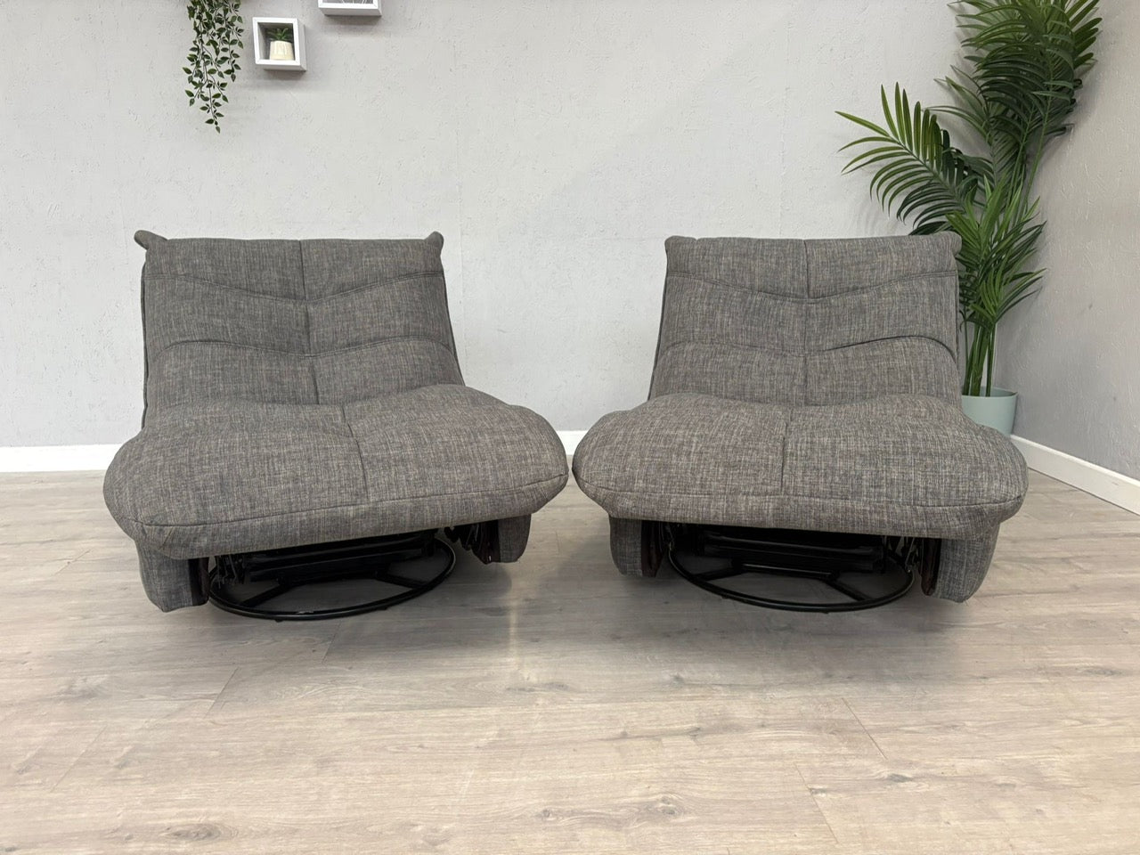 DFS Clarke Pair Of Swivel Rocker Manual Recliner Chairs - RRP £1058