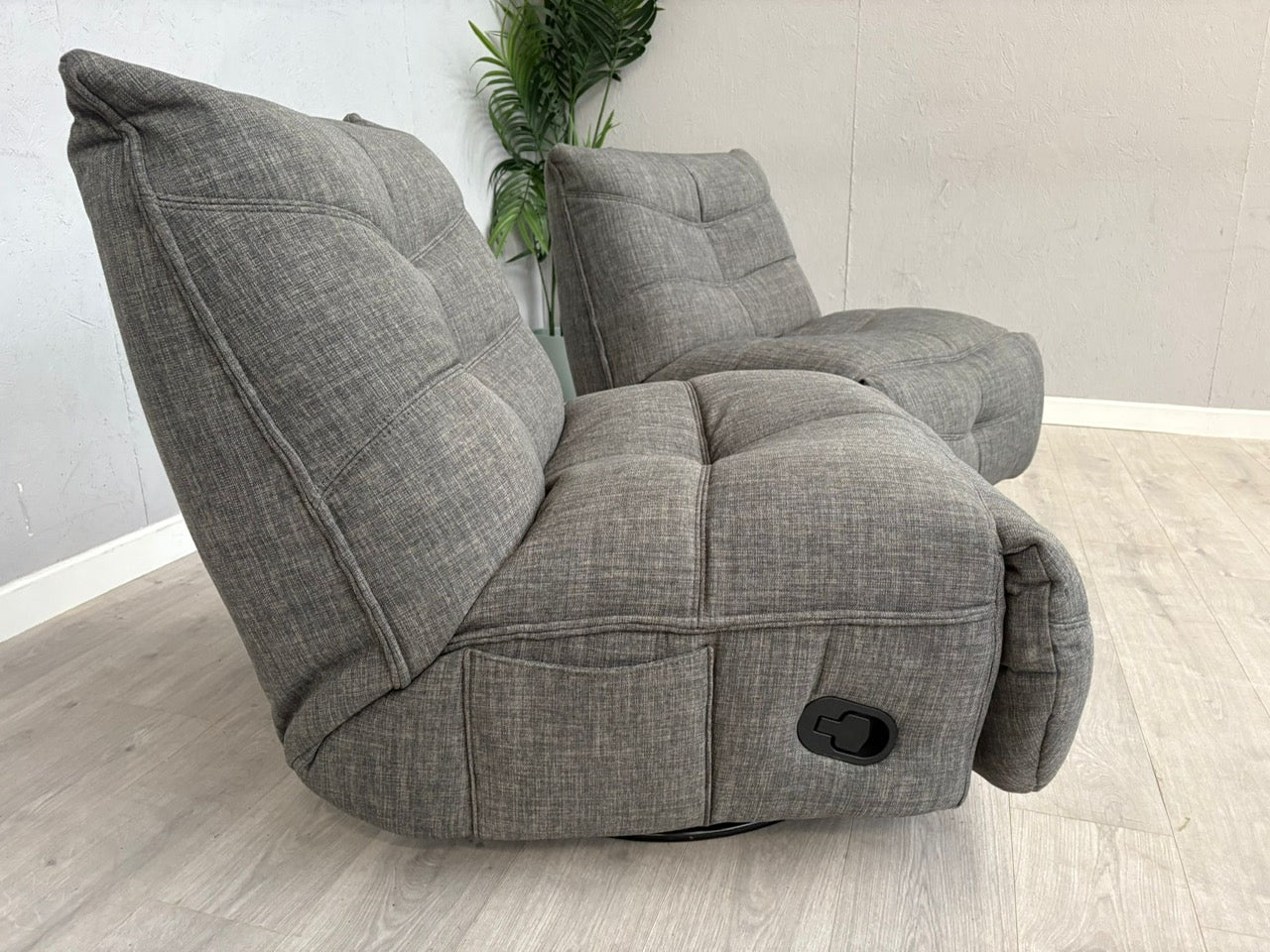 DFS Clarke Pair Of Swivel Rocker Manual Recliner Chairs - RRP £1058